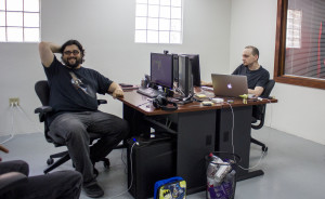 Arthur Griffith (left), CEO of Desert Owl Games, and Justin Fleecer, co-founder of Desert Owl Games, sit at their desks designing video games in their new office in Tucson, Ariz. on Monday, May 4, 2015. Photo by Rebecca Marie Sasnett / Arizona Sonora News Service