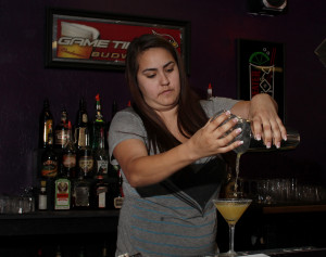 Marybell Aquayo practices making margarita in the Bartending Academy in Tempe, Ariz. She wants to be a bartender because it allows her to express her creativity by mixing drinks. (Photo by Alamri/ Arizona Sonora News)