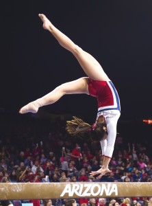 Shelby Edwards on the balance beam in McKale Center