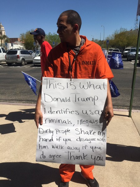 Protestor stands outside Donald Trump's rally on March 19, 2016 in Tucson, Arizona. Photo by Christianna Silva.