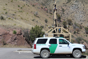 Border Patrol vehicles stationed at the top of Coronado Peak.