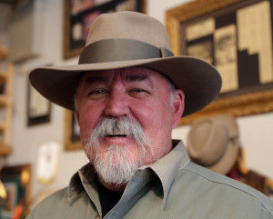 Bill McKay is very happy with his new fedora, which he bought as a 60th birthday present for himself. He said hatter S. Grant Sergot hit a "home run" with the hat. Photo by Karen Schaffner/Arizona Sonora News Service
