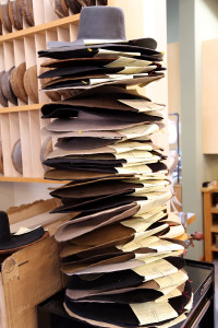 At Watson's Hat Shop, a stack of raw bodies, or blank hats, waits for Eric Watson to make them into expensive, custom-made hats. Photo by Karen Schaffner/Arizona Sonora News Service