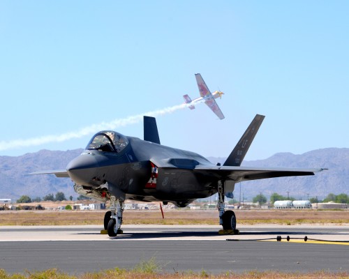 A+F-35+Lightning+stands+in+front+of+a+Red+Bull+demonstration+plane+at+Luke+AFBs+show+April+2.+Photo+courtesy+of+Airman+1st+Class+Ridge+Shan