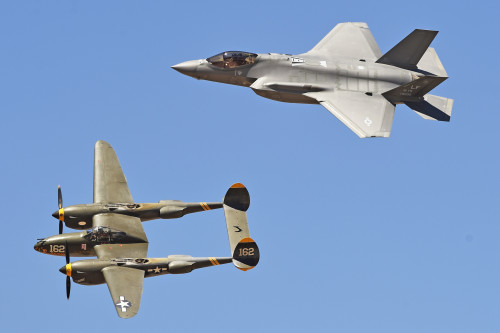 Old and new fly side-by-side. This "heritage flight" features the F-35 Lightning II and the original Lightning, the P-38. Photo courtesy of Staff Sgt. Staci Miller