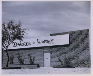 The factory of Dolores Gonzales in Tucson, Arizona, where she and other workers produced intricate squaw dresses. The factory is still standing today, but the sign has faded. (Photo Courtesy of Tucson Historic Preservation Foundation and Dolores Gonzales Family.)