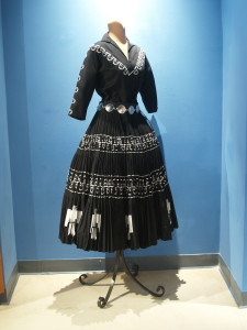 A displayed squaw dress highlights the dress' intricate details and handiwork. (Photo Courtesy of the Arizona Historical Society.)