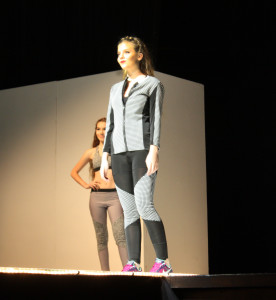 A Flowing Wells High School student models student designed athletic wear during the school's 2016 Fusion fashion show in Tucson, Ariz. 