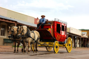 A stagecoach driver awaits his next tour on Allen Street in Tombstone, Ariz. on Sunday, Sept. 11, 2016. (Photo by Julianne Stanford / Arizona Sonora News Service)