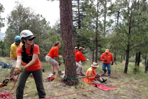Members of the Southern Arizona Rescue Association (SARA) conduct regular team trainings in technical rope rescue in July of 2015. These rope systems may be used to aid fallen climbers or hikers, or rescue individuals from vehicles that have gone off-highway in steep terrain. (Photo courtesy of Southern Arizona Rescue Association)