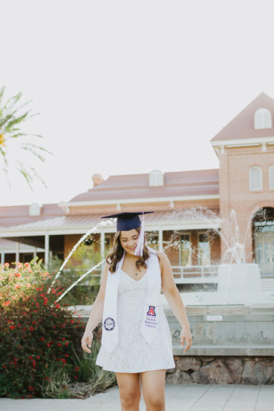 Olivia Schanafelt in front of Old Main, at the University of Arizona. (Photo by Olivia Schanafelt/El Inde).