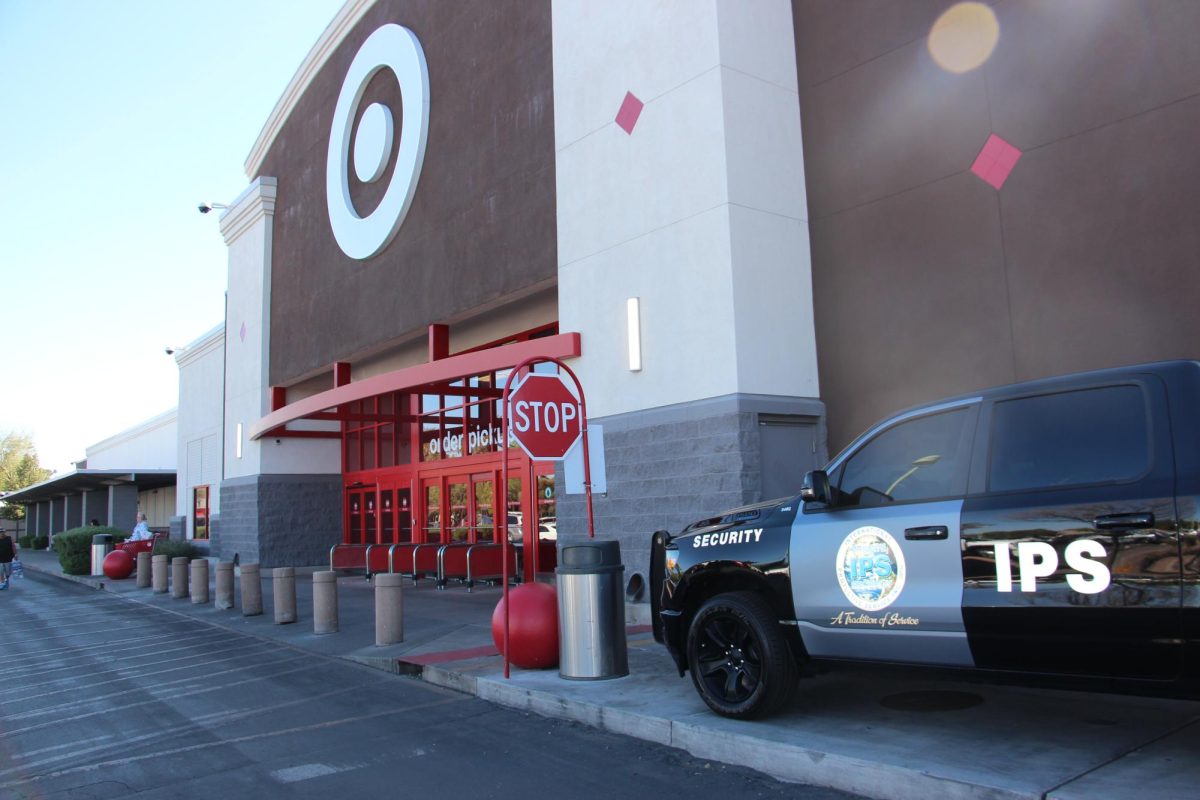 
A security vehicle stationed outside a Target store, reflecting heightened measures to combat the surge in organized retail crime in Tucson, which has seen significant financial losses since the pandemic.
