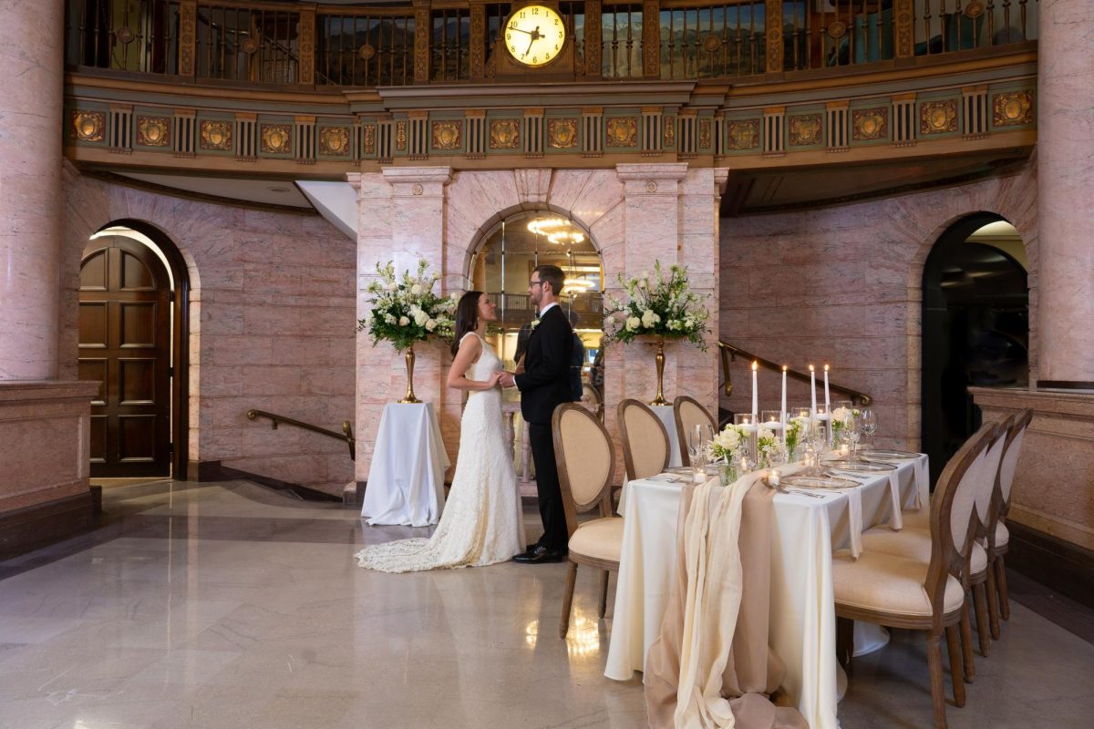 Couples often stand beneath the clock during their ceremony at the Treasury 1929.