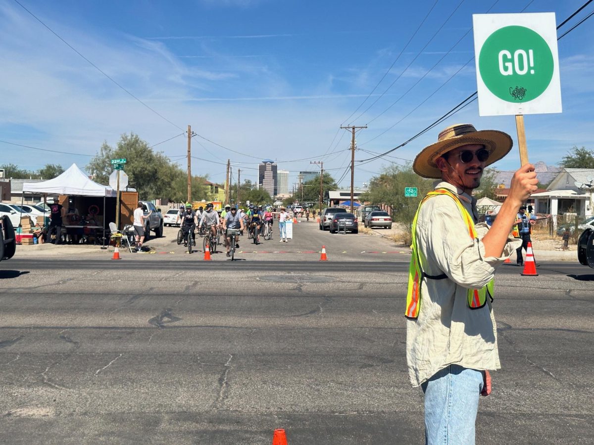 Traffic guards managed crossings for riders at 22nd Street during Cyclovia on Sunday, October 27.