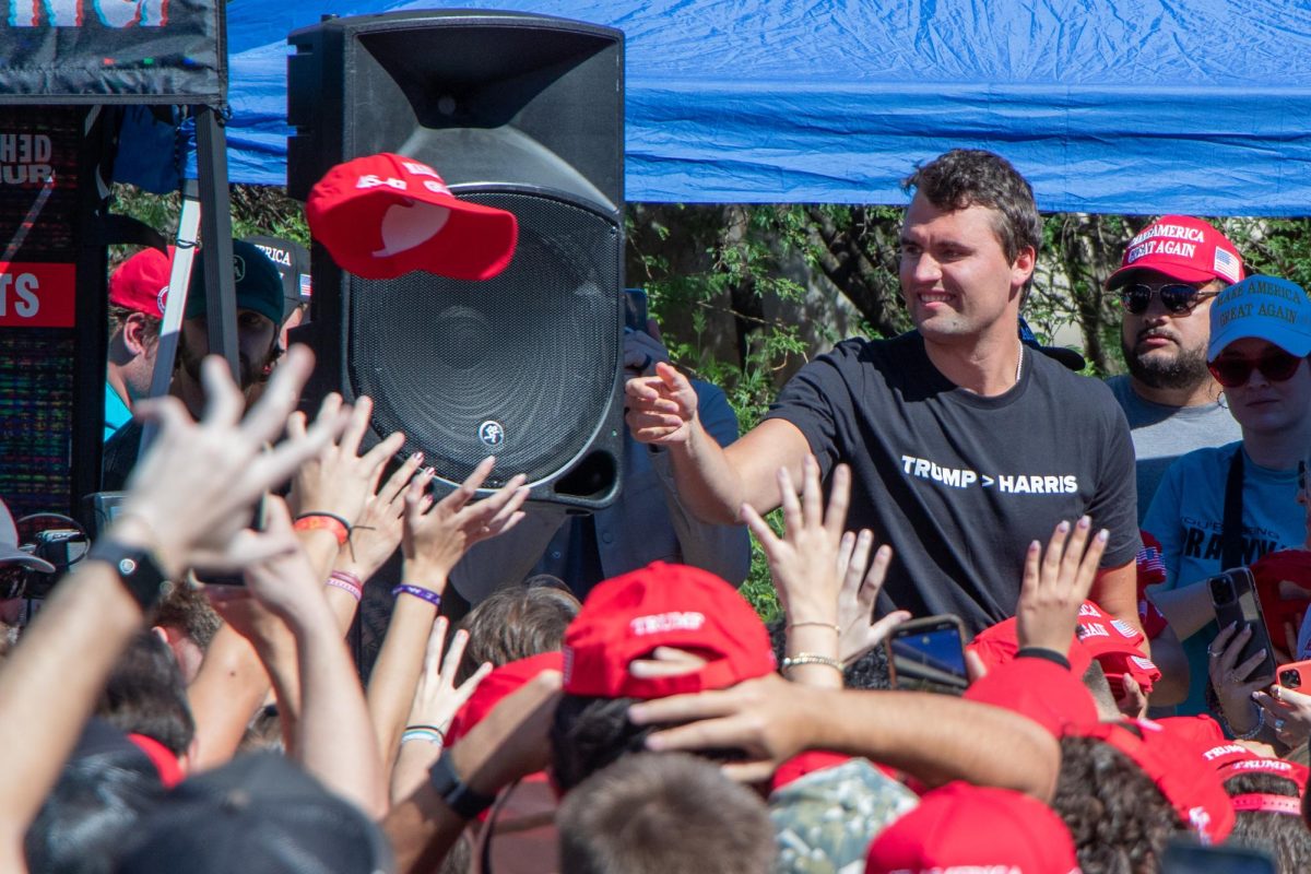 Charlie Kirk a well known republican and political influencer came to the University of Arizona campus on Oct. 16. Kirk through hats to the crowd of students after he arrived on campus. 