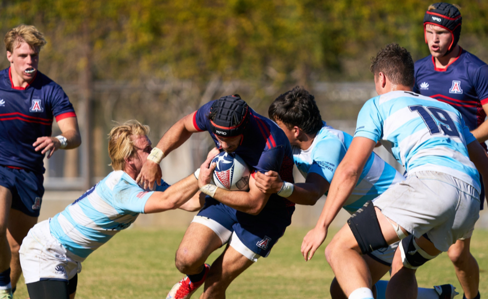 UA rugby player Mattox King rumbles past San Diego's defense on Nov. 9 in the Wildcats 50-17 win.