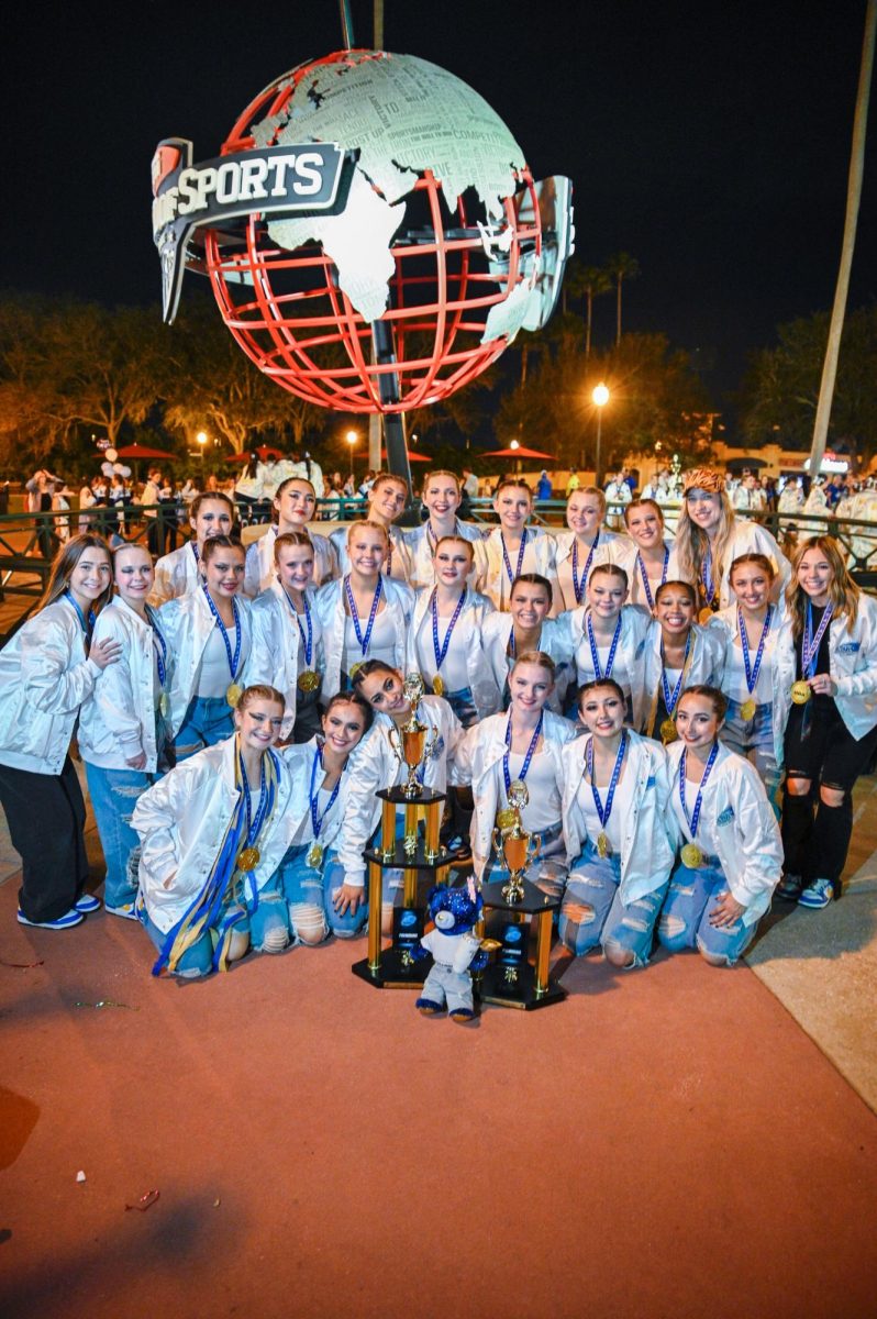 Marana High Dance team members pose with trophies at the ESPN Wide World of Sports Complex. (Photo courtesy of Maya Alexander)