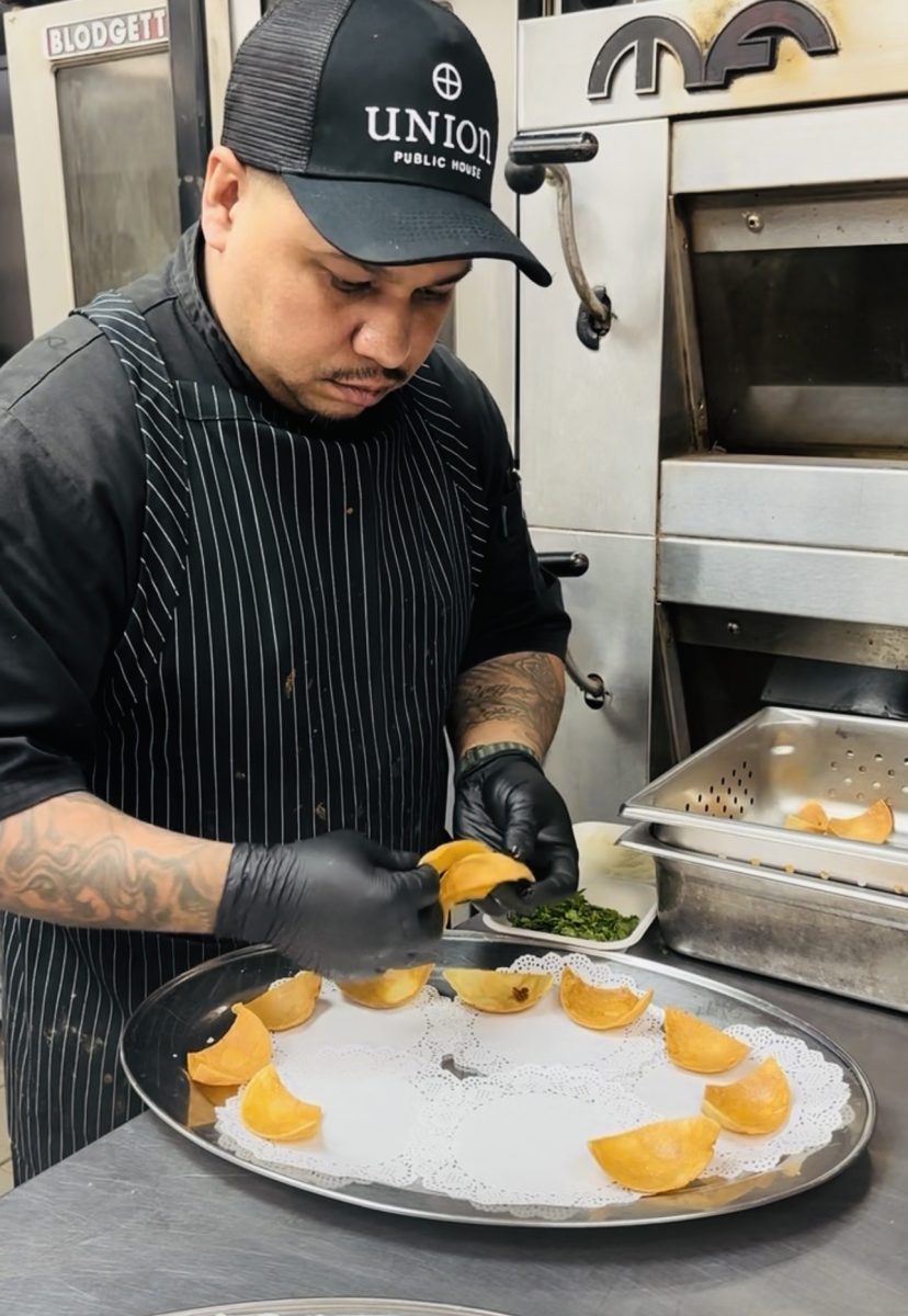 Chef David Palma Chavez prepares an appetizer at Union Public House. Owner Grant Krueger is working with technology as a way to combat the minimum wage increase. 