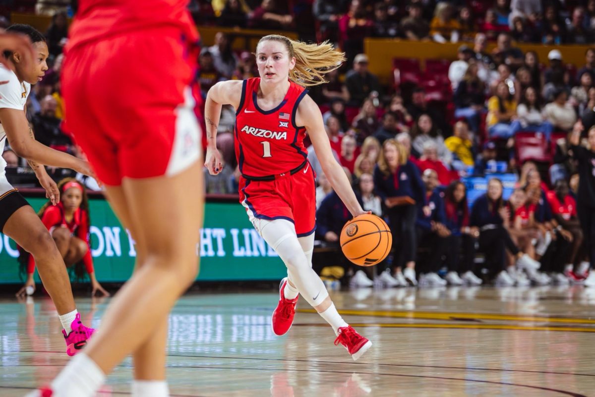 Kamryn Kitchen working to keep the momentum on the road in the first half against rival Sun Devils.