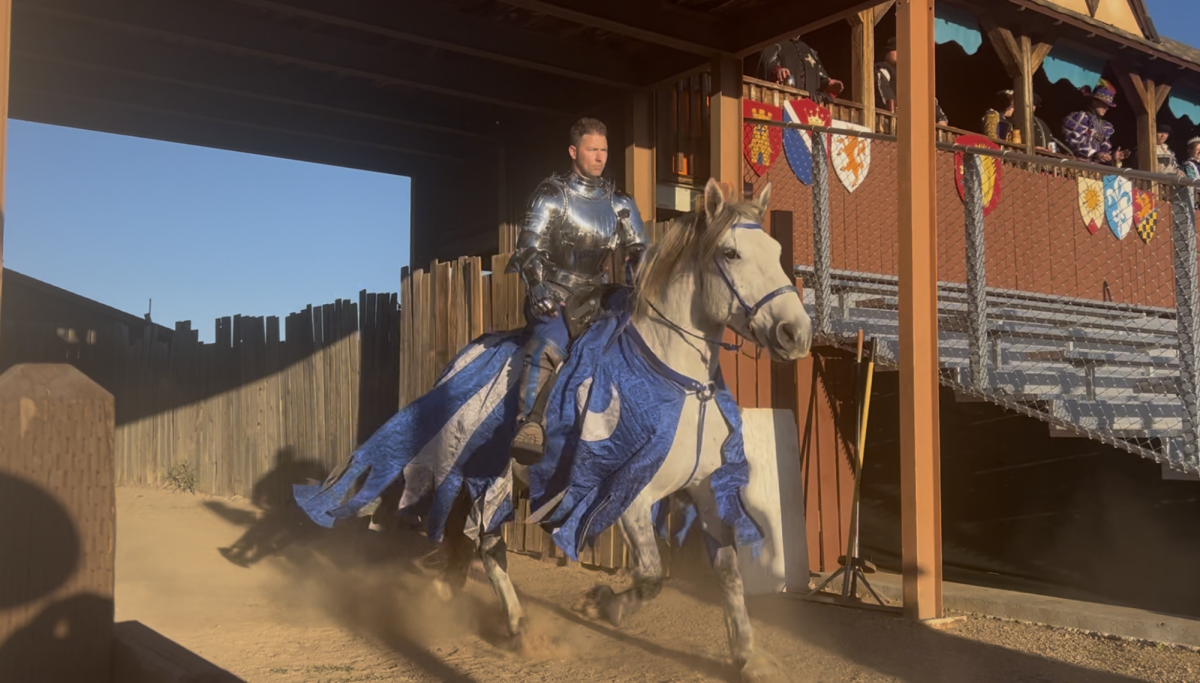 An actor portraying a knight charges onto the jousting pitch at the Arizona Renaissance Fair on Jan.  31