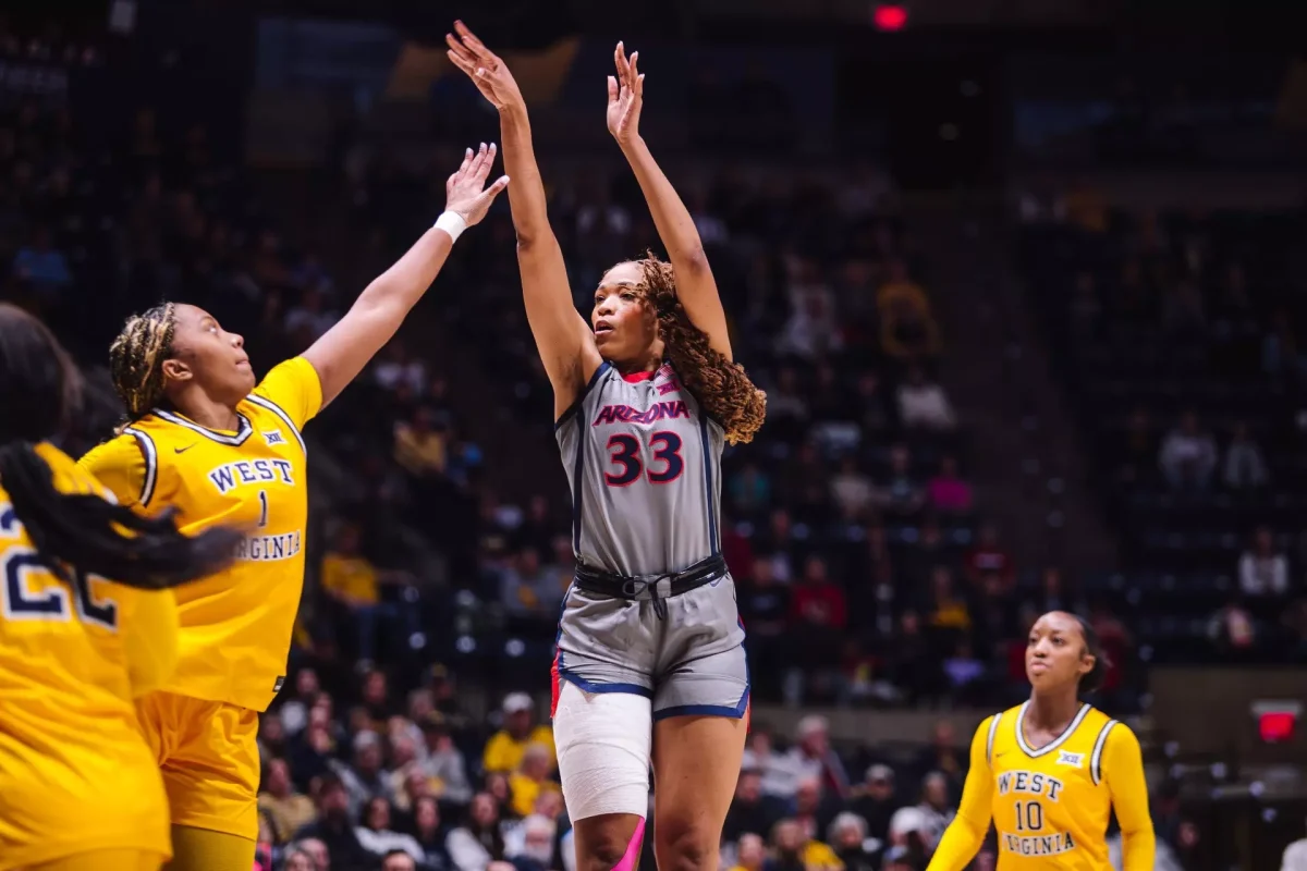 Daniah Trammell (33) shooting against West Virginia's Carter McCray (1) at Hope Coliseum Feb. 7, 2026. 
Photo by Arizona Athletics. 