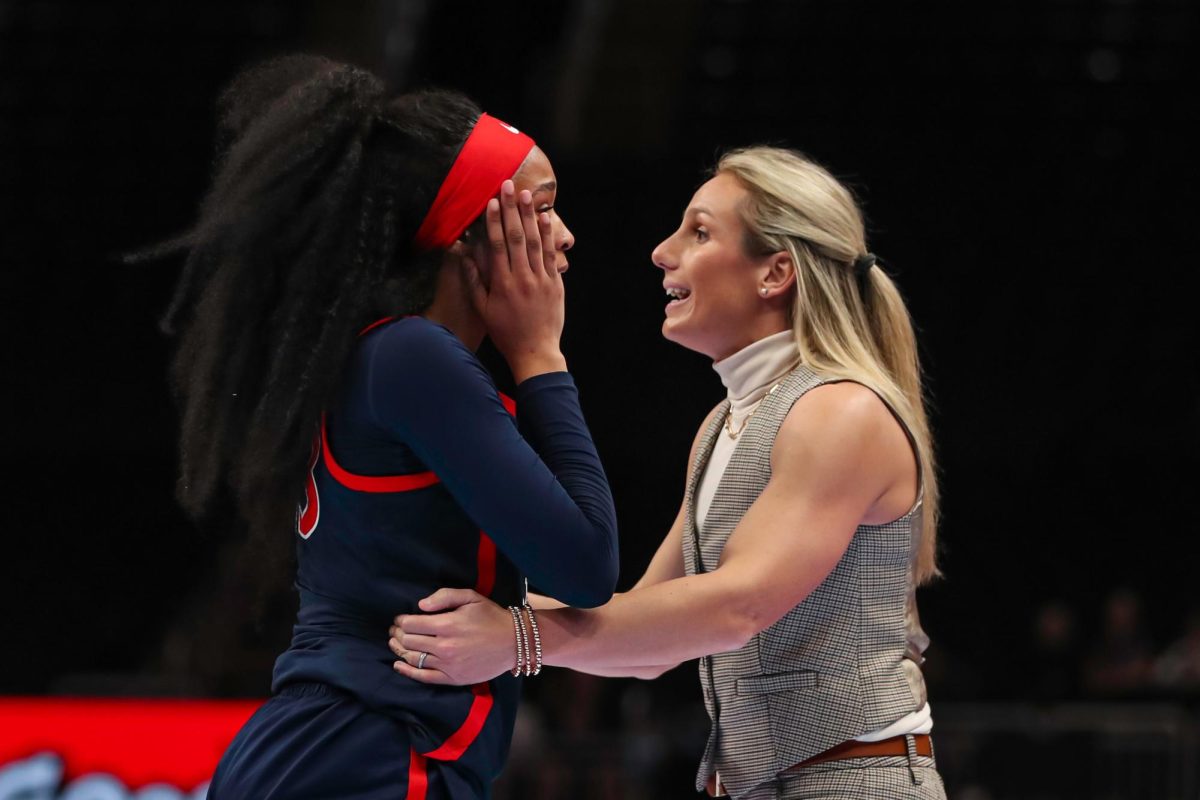 Arizona Head Coach Becky Burke with Daniah Trammell after a flagrant foul call against rival ASU at T Mobile Center in Kansas City on March 4, 2026.
Photo by Big 12 Media