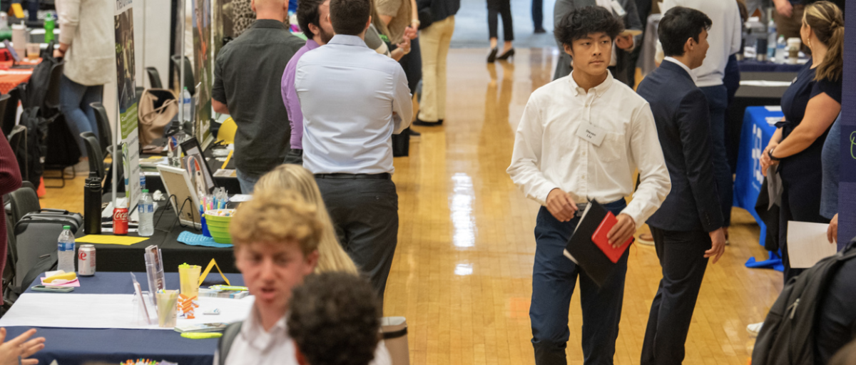 Students speak with employers at a recent University of Arizona career fair. (Photo courtesy of UA Library)