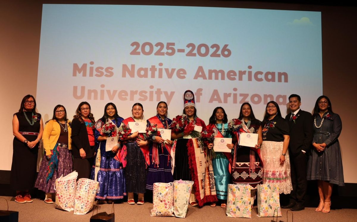 Six contestants and judges standing on the stage of the 2025 Miss Native American University of Arizona on April 4, 2025 at the Gallagher Theater. (Courtesy of Amani LaRae)
