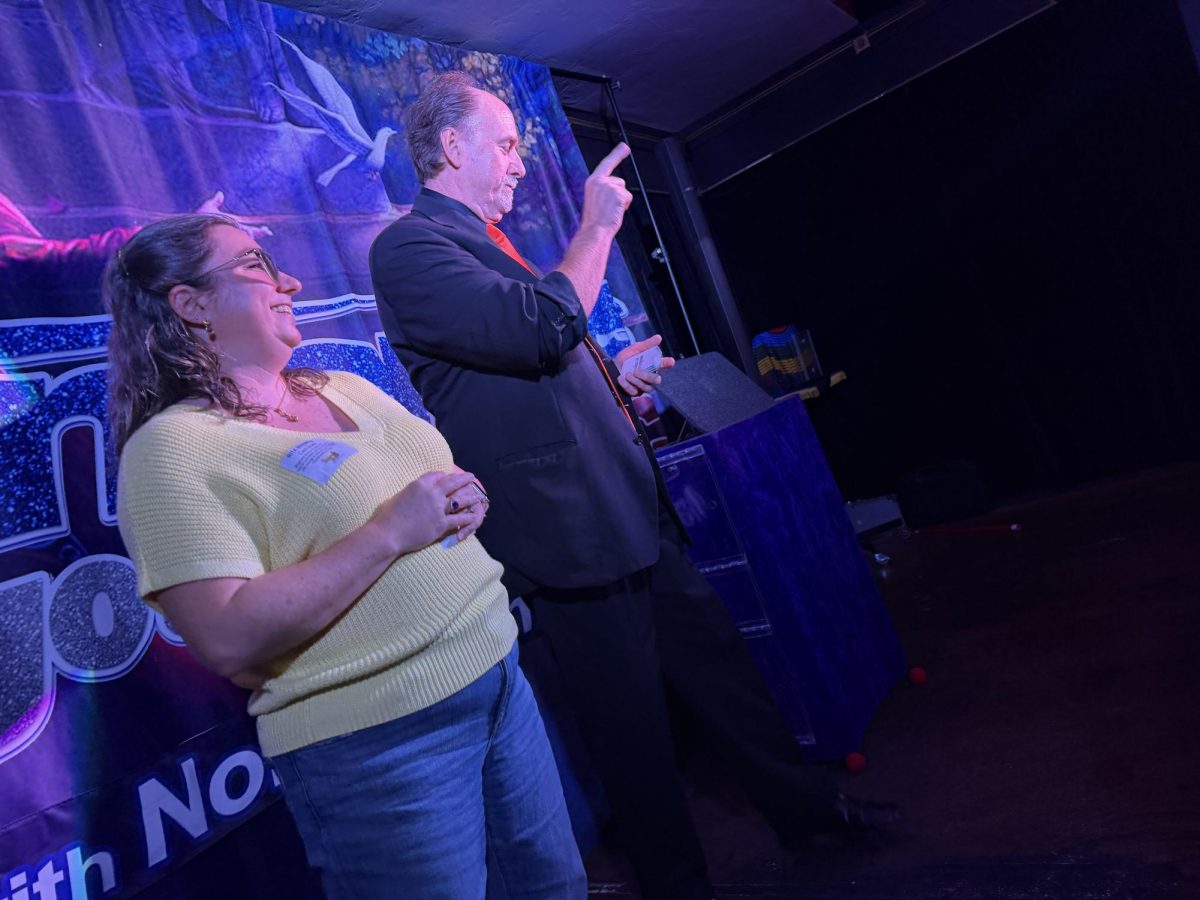 Mystery and Magic guest Jessica Doherty (left) prepares to do a trick with magician Norm Marani on Saturday, March 28, 2026.
