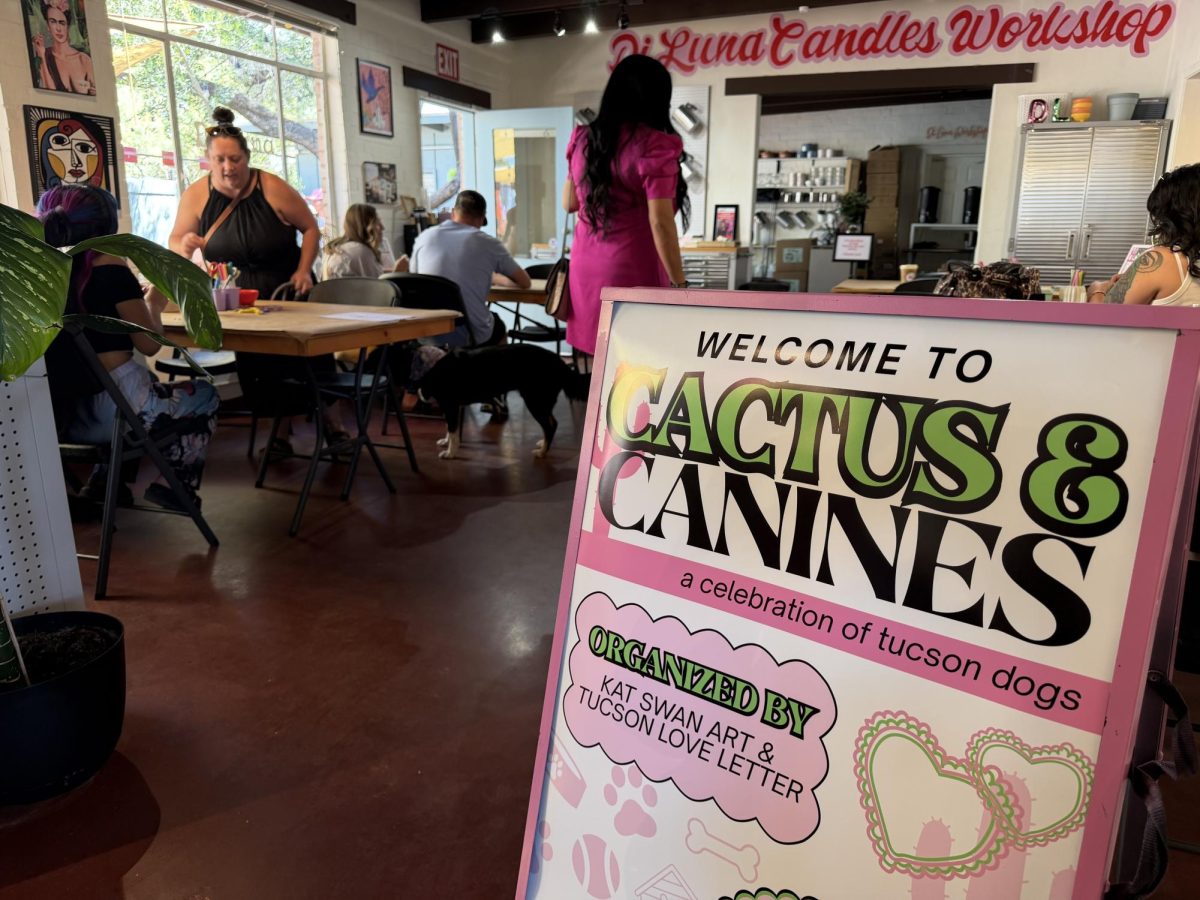 Guests gather at the craft station at the Cactus & Canines event hosted by Kat Swan and Tucson Love Letter at Di Luna Candles on Saturday, April 11, 2026. There were many local merchandise vendors and food vendors for guests and their dogs to enjoy.