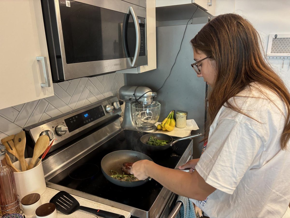 Lilly Fine prepares a Filet meal in her Ari on Fourth apartment on April 1. She also prepared a brisket for Passover. 