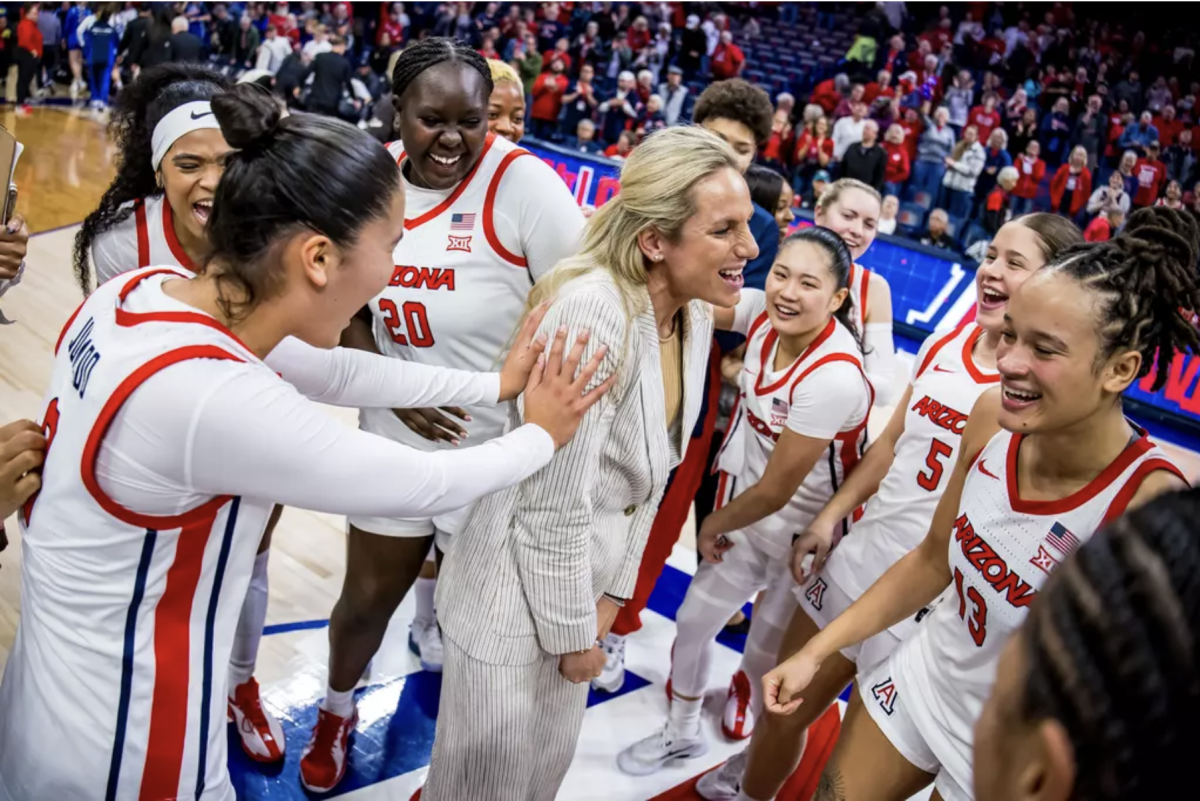 UA Women's Basketball Head Coach Becky Burke celebrating a win over BYU Jan, 6. 2026 at McKale Center at ALKEME Arena. Photo by Arizona Athletics.